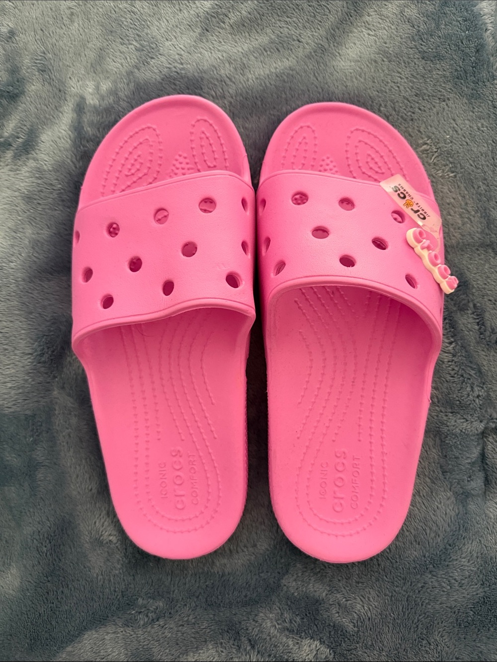 New CROCS woman’s  Bright Pink Slide Sandals. Size 10